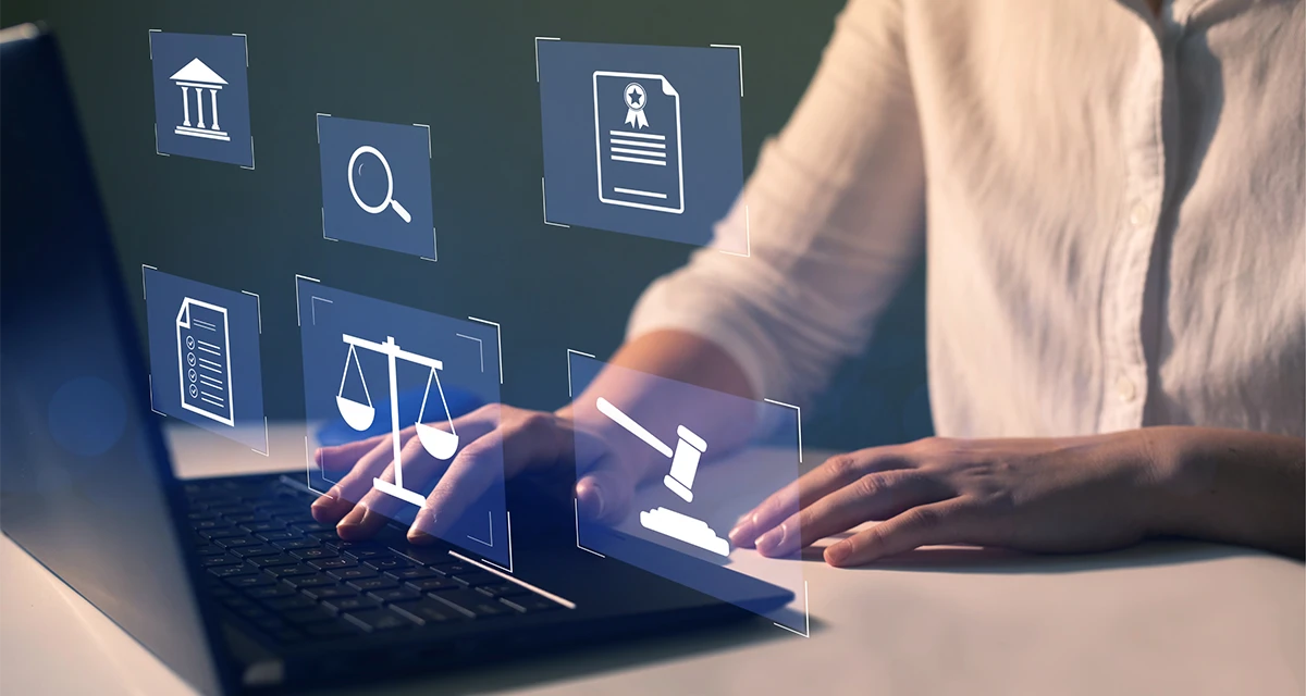 A person using a laptop with digital legal icons overlaying the screen, including a gavel, scales of justice, and a certified document, illustrating the convenience of a Power of Attorney Online Service vs Physical Notarization in Dubai for secure legal documentation.