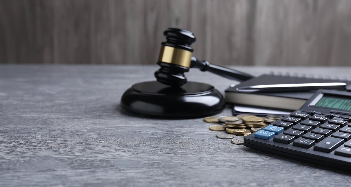 Dubai power of attorney online services with gavel, calculator, coins and legal documents